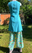 Robe Cricri Cup cakes turquoise. Encolure ronde, sans manche, festons