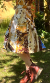 Robe Vacances Romaines imprimé Peinture sable. Coton, col, jupon plis
