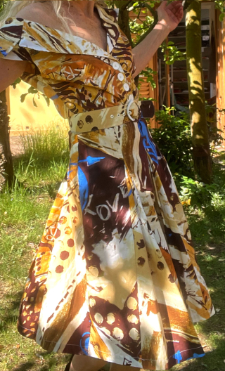 Robe Vacances Romaines imprimé Peinture sable. Coton, col, jupon plis
