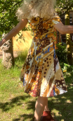 Robe Vacances Romaines imprimé Peinture sable. Coton, col, jupon plis