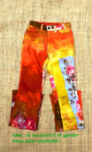 Pantalon Monet orange. Petite fille. Taille 32 ou 34, coton fleurs 