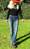 Pantalon Denim imprimé fleurs. Taille 36. Jean 5-poches stretch