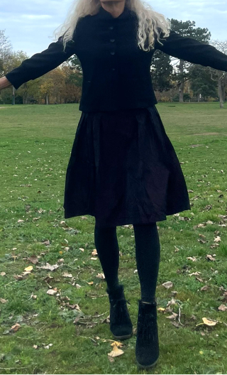 Veste Les Batignolles. Noir. Courte doublée, col debout, couture