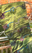 Coupon. Taffetas olive fleur. Polyester froissé brodé. Tissu