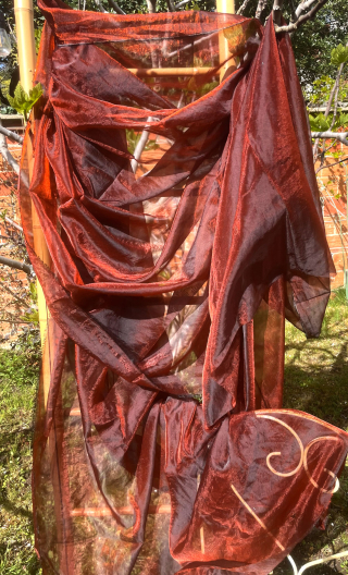 Coupon. Organza rouille orangé. Voile polyester. Tissu, couture