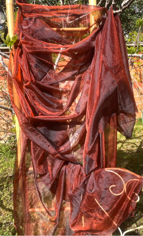 Coupon. Organza rouille orangé. Voile polyester. Tissu, couture