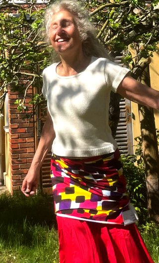 Pull manche courtes. Maille écrue