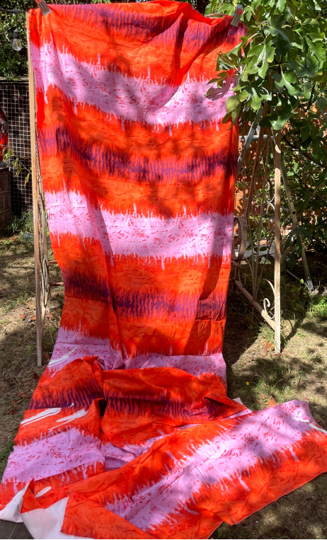 Coupon vendu par 2 m. Coton imprimé orange et lilas - 1