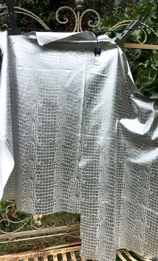 Chute de production. Reptile argent - 1