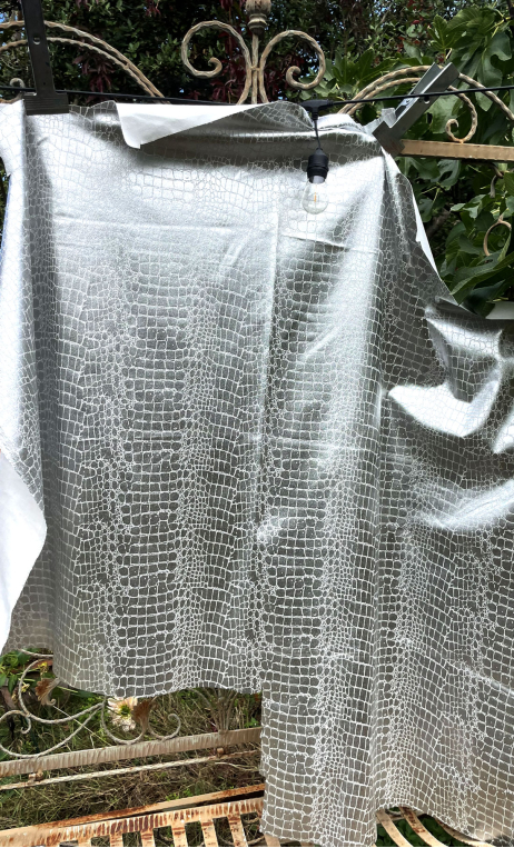 Chute de production. Reptile argent - 1